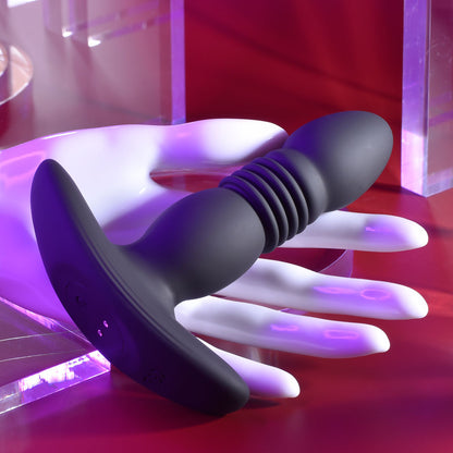 Playboy Pleasure TRUST THE THRUST - Black 13.7 cm USB Rechargeable Thrusting Butt Plug with Wireless Remote